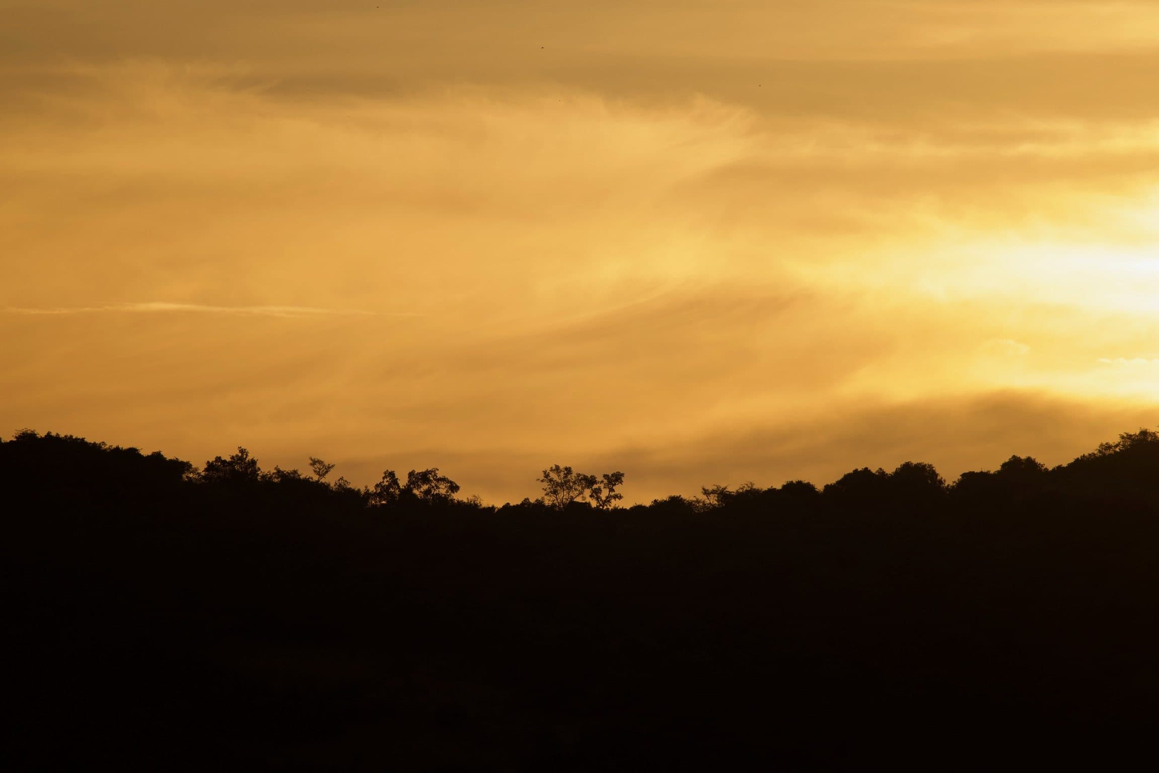 Sunset over the hills of Akagera National Park