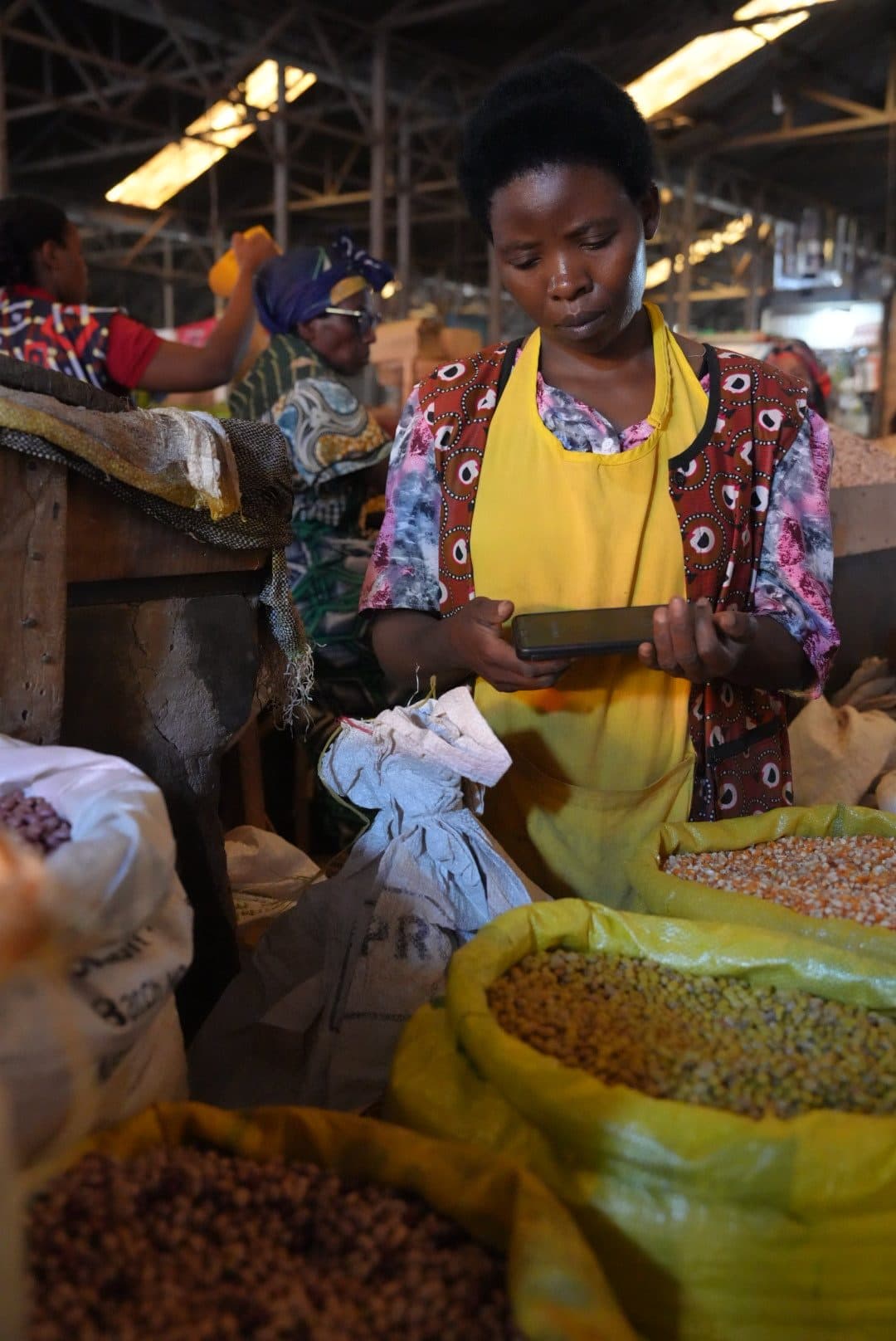 Vendor at Kimironko market in Kigali